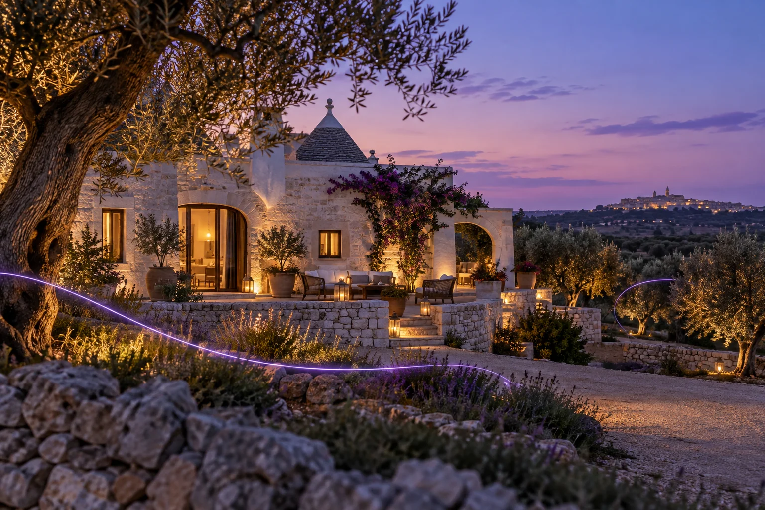 Una casa tra gli ulivi al tramonto